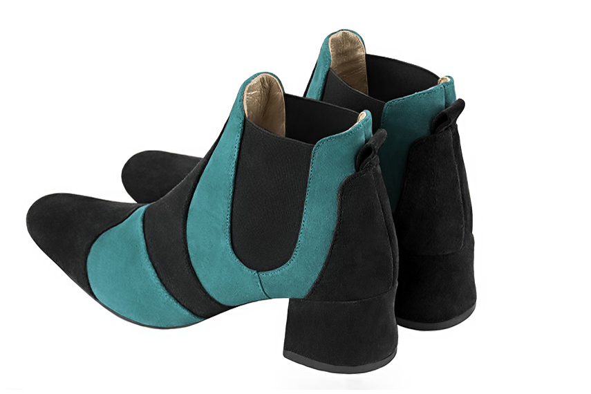 Matt black and aquamarine blue women's ankle boots, with elastics. Round toe. Low flare heels. Rear view - Florence KOOIJMAN